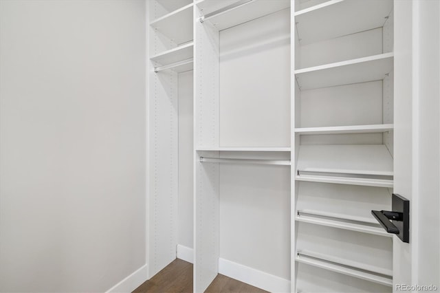 2010 Irving St, Denver, CO 80211 - spacious closet featuring dark wood-style floors