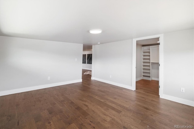 2010 Irving St, Denver, CO 80211 - unfurnished living room featuring dark wood finished floors and baseboards
