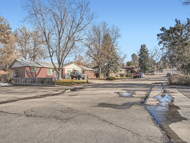 view of road featuring curbs and sidewalks