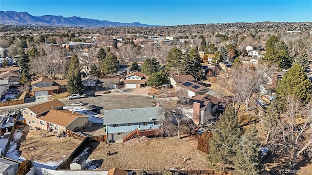 birds eye view of property featuring a mountain view