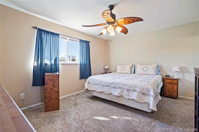 bedroom featuring light colored carpet and ceiling fan