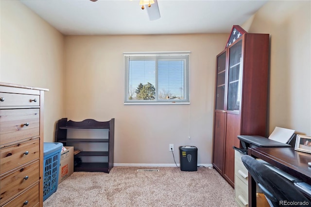 miscellaneous room featuring light carpet and ceiling fan