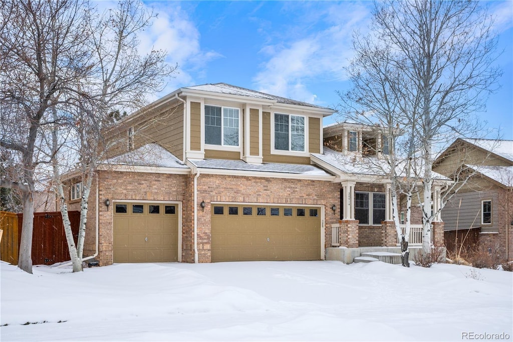 view of front of property with a garage