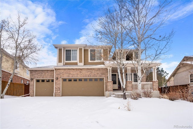 view of front of home featuring a garage and covered porch