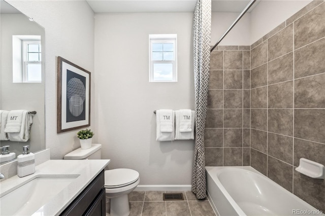 full bathroom featuring tile patterned flooring, vanity, toilet, and shower / bath combo