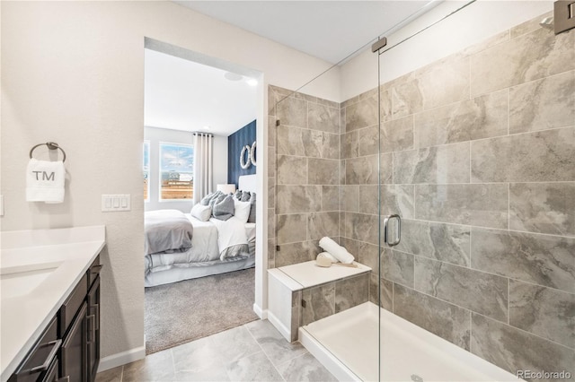 bathroom featuring vanity and a shower with shower door