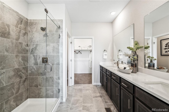 bathroom featuring vanity and walk in shower