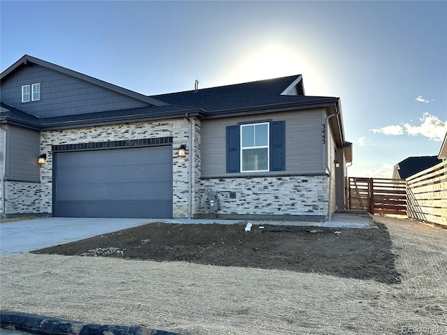 view of front of property with a garage