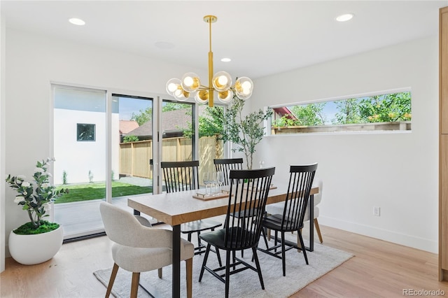 1647 N Osceola St, Denver, CO 80204 - dining area featuring a chandelier, light wood-style floors, baseboards, and recessed lighting