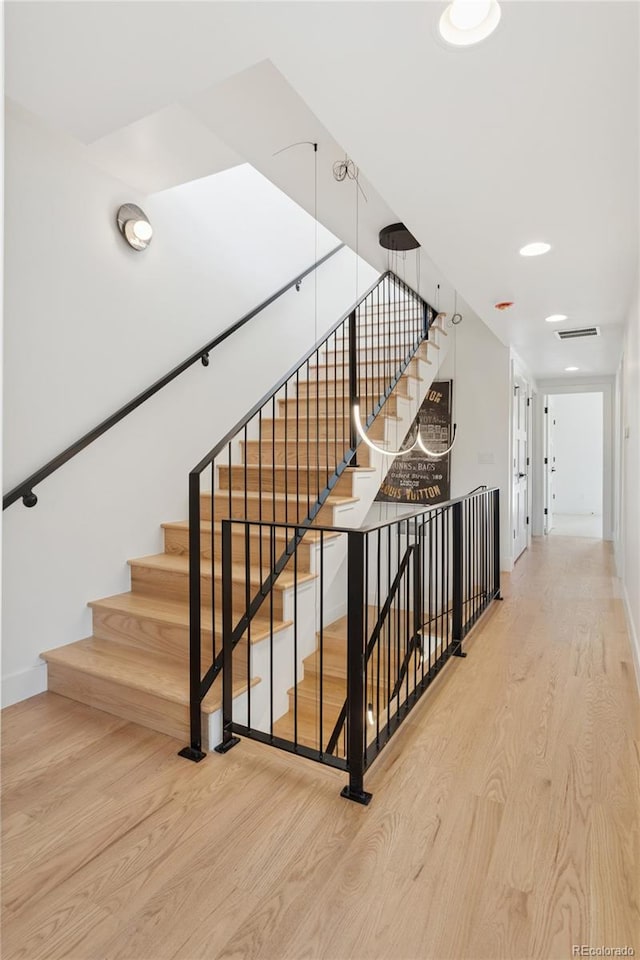 1647 N Osceola St, Denver, CO 80204 - stairs with wood finished floors and baseboards