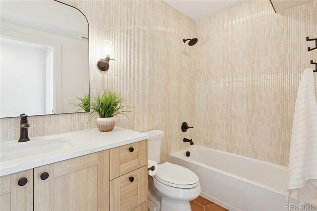 1647 N Osceola St, Denver, CO 80204 - bathroom with tile walls, vanity, shower / bathtub combination with curtain, toilet, and tasteful backsplash