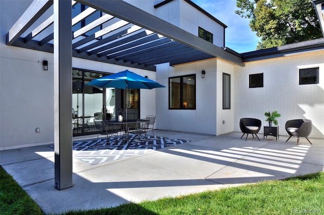 view of patio / terrace featuring a pergola