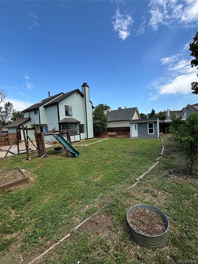 4362 Denmark Ct, Denver, CO 80239 - fenced backyard with a playground
