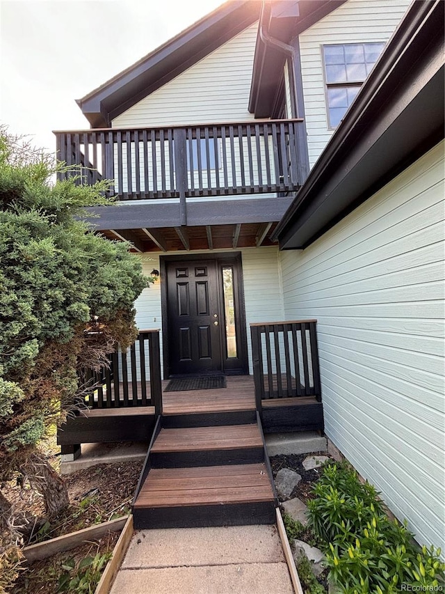 4362 Denmark Ct, Denver, CO 80239 - doorway to property with a balcony and a porch