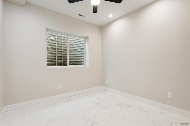 empty room featuring ceiling fan