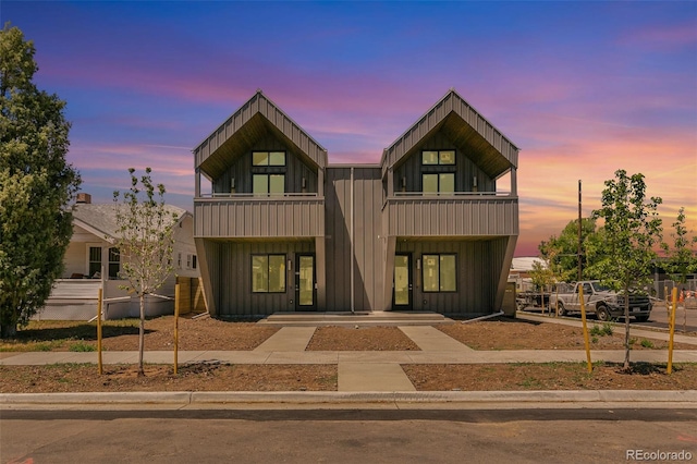 2403 S Cherokee St, Denver, CO 80223 - contemporary home with board and batten siding and a balcony