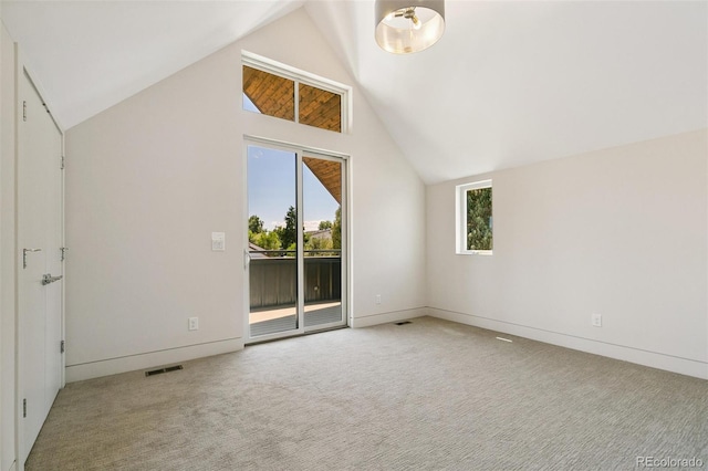 2403 S Cherokee St, Denver, CO 80223 - additional living space with lofted ceiling and carpet floors