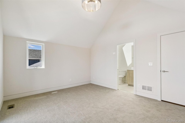 2403 S Cherokee St, Denver, CO 80223 - bonus room featuring light carpet and vaulted ceiling
