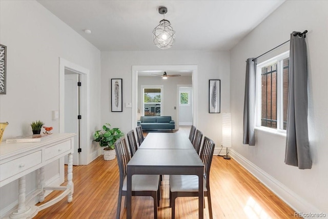3953 Tejon St, Denver, CO 80211 - dining area with light wood-type flooring, ceiling fan, and baseboards