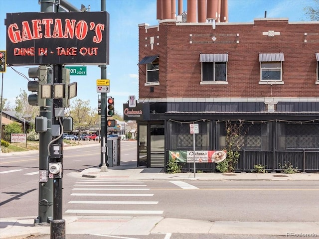 3953 Tejon St, Denver, CO 80211 - view of asphalt road featuring traffic lights, sidewalks, and curbs