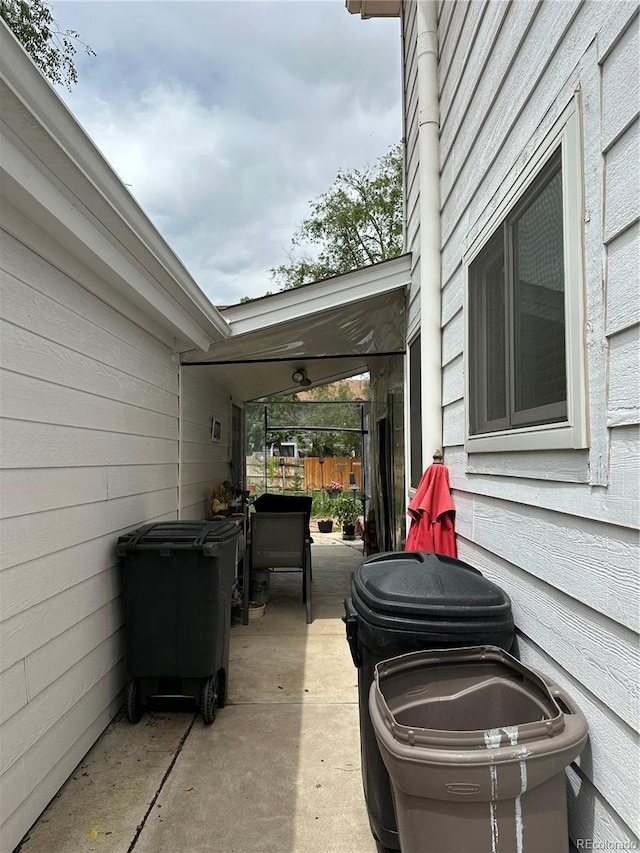 view of patio / terrace featuring fence