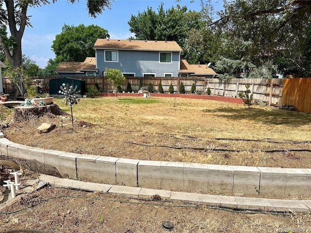 view of yard featuring a fenced backyard