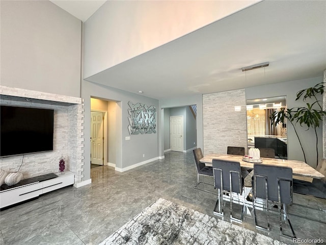dining space with baseboards