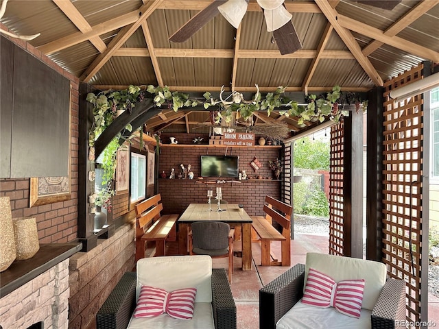view of patio featuring a gazebo and outdoor dining space