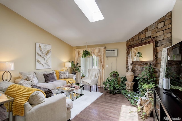 10150 E Virginia Ave Unit 18-302, Denver, CO 80247 - living room featuring vaulted ceiling, a wall unit AC, a skylight, and wood finished floors