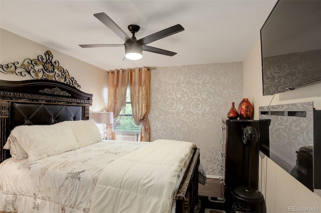 10150 E Virginia Ave Unit 18-302, Denver, CO 80247 - bedroom with wallpapered walls and ceiling fan