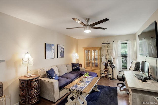 10150 E Virginia Ave Unit 18-302, Denver, CO 80247 - living area with ceiling fan, wood finished floors, and a wall mounted air conditioner