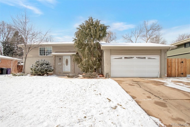 view of front of property with a garage