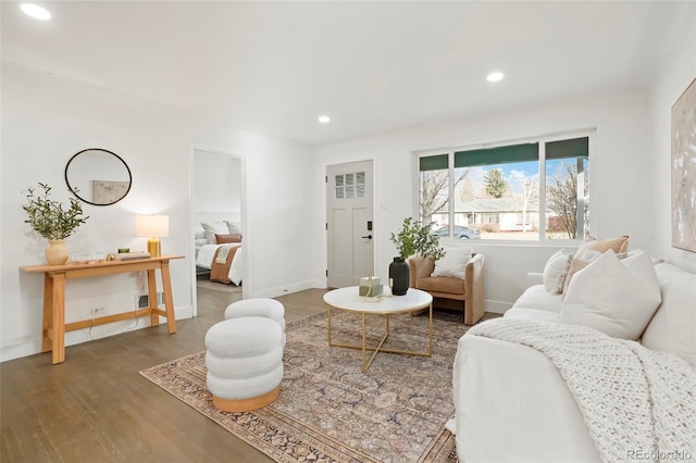211 Newport St, Denver, CO 80220 - living area featuring wood finished floors, recessed lighting, and baseboards