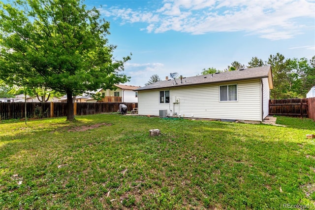 4520 E 112th Pl, Thornton, CO 80233 - rear view of property with central AC