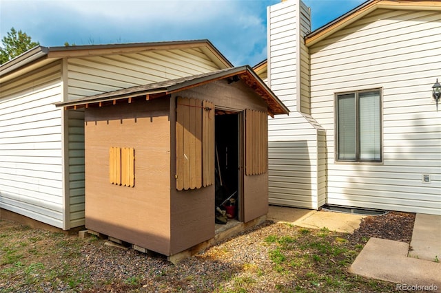 4520 E 112th Pl, Thornton, CO 80233 - view of property exterior featuring a chimney