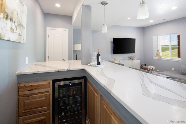 18992 W 84th Ave, Arvada, CO 80007 - indoor dry bar with beverage cooler, hanging light fixtures, and recessed lighting