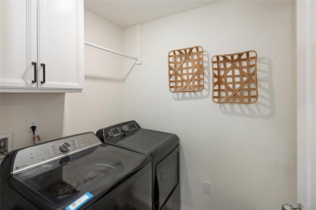 18992 W 84th Ave, Arvada, CO 80007 - laundry area with cabinet space and independent washer and dryer