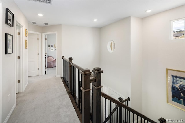 18992 W 84th Ave, Arvada, CO 80007 - corridor featuring an upstairs landing, carpet flooring, and recessed lighting