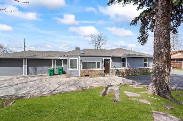 3625 Chase St, Wheat Ridge, CO 80212 - single story home featuring driveway, stone siding, a garage, a front yard, and a chimney