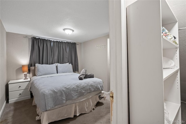 3625 Chase St, Wheat Ridge, CO 80212 - carpeted bedroom with a textured ceiling