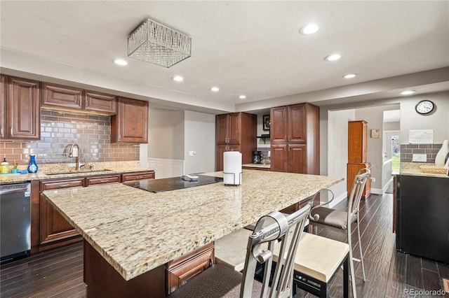 3625 Chase St, Wheat Ridge, CO 80212 - kitchen featuring a sink, black electric cooktop, stainless steel dishwasher, dark wood-style floors, and recessed lighting
