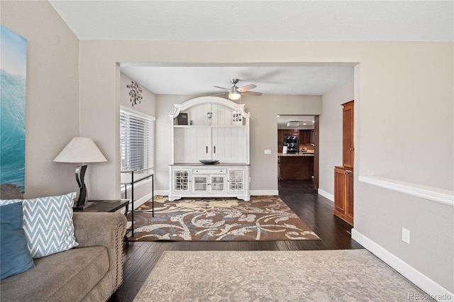 3625 Chase St, Wheat Ridge, CO 80212 - living room with wood finished floors, ceiling fan, and baseboards