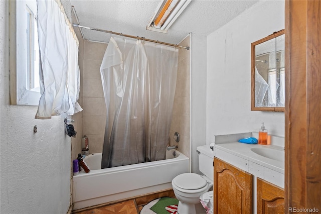 3625 Chase St, Wheat Ridge, CO 80212 - bathroom featuring vanity, shower / bath combo, toilet, a textured ceiling, and plenty of natural light