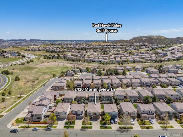 aerial view with a residential view and a mountain view