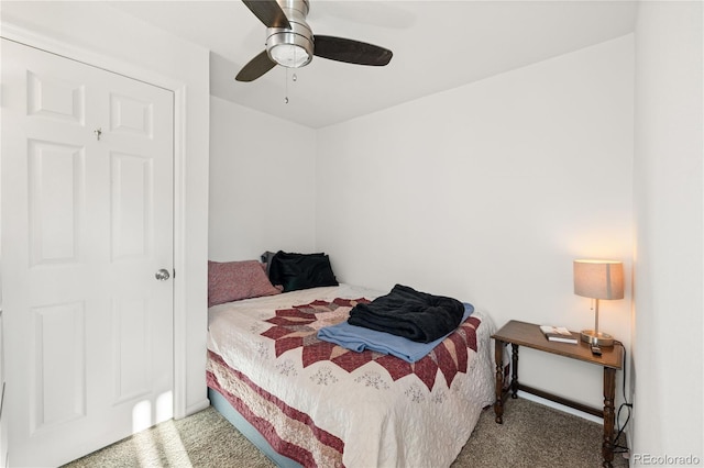 carpeted bedroom with a ceiling fan