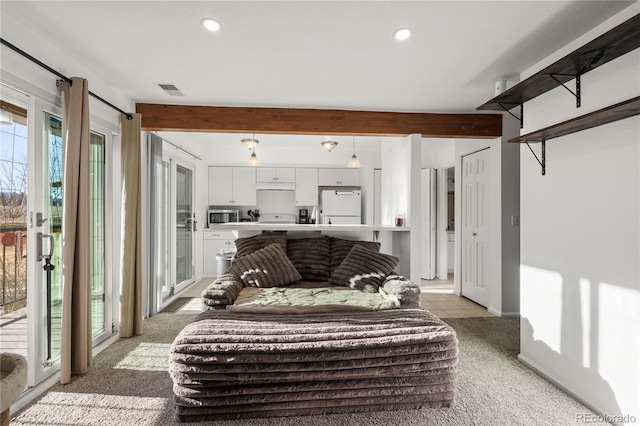 interior space featuring recessed lighting, light colored carpet, and beamed ceiling