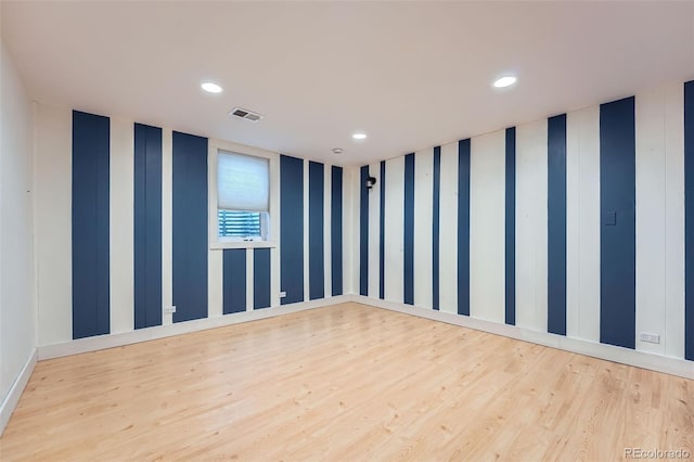 12189 Boot Hill Dr, Parker, CO 80138 - empty room with wood finished floors, recessed lighting, and baseboards