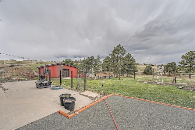 12189 Boot Hill Dr, Parker, CO 80138 - view of green lawn featuring an outdoor structure and a pole building