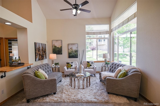 588 Stafford Cir, Castle Rock, CO 80104 - living area featuring a ceiling fan, carpet floors, and high vaulted ceiling