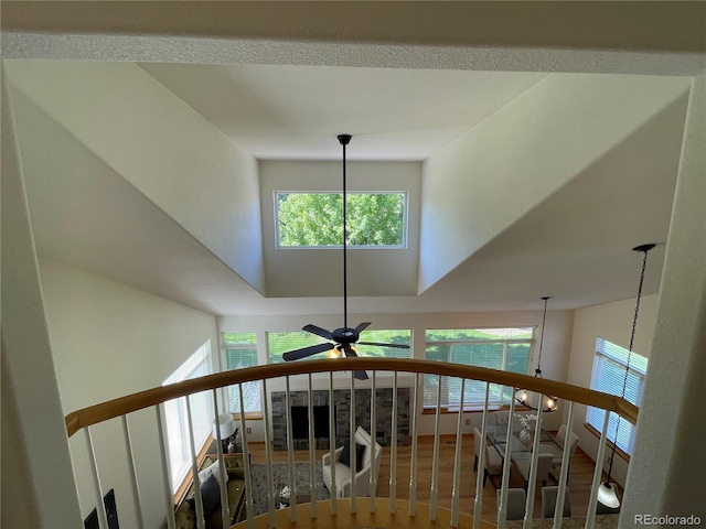 588 Stafford Cir, Castle Rock, CO 80104 - stairs with a towering ceiling, healthy amount of natural light, and a ceiling fan